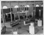 Photograph of the Woman's Homework exhibit, textile division, at the Georgia State Fair, Macon, Bibb County, Georgia, 1940
