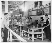 Photograph of a community canning demonstration at the Georgia State Fair, Macon, Bibb County, Georgia, 1943