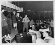 Photograph of a nighttime midway show at the Georgia State Fair, Macon, Bibb County, Georgia, 1950