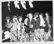 Photograph of people looking at toys at the Georgia State Fair, Macon, Bibb County, Georgia, 1951