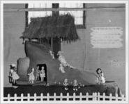 Photograph of a 4-H club's food project exhibit at the Georgia State Fair, Macon, Bibb County, Georgia, 1958