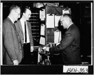 [Photograph of the Mayor of Fitzgerald stamping letter with a cancellation stamp, Fitzgerald, Ben Hill County, Georgia, 1965]