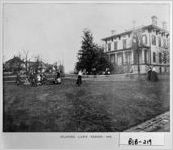 PLAYING LAWN TENNIS - 1901