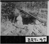 [Photograph of Ameretta Brooke Matthews drawing water, Bartow County, Georgia]