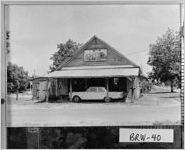 [Photograph of Elliott's Upholstery and Furniture Repairs Shop, Carl, Barrow County, Georgia, 1976]