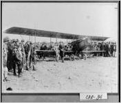 [Photograph of crowd, including C. W. Meyer, pilot, and Burt Hood, passenger, gathered around biplane, Bowdon, Carroll County, Georgia, 1920 Feb. 2 ]