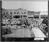 [Photograph of a trapeze artist in front of a crowd, Moultrie, Colquitt County, Georgia, 194-]