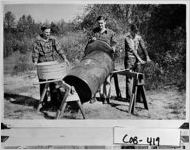 [Photograph of seed treatment process, Lost Mountain Community, Cobb County, Georgia, 1949]