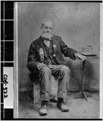 [Cabinet card of T.L. Mitchell]