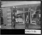 [Postcard of Alonzo Webb and Jim Webb in front of A. A. and J. G. Webb General Store, Adel, Cook County, Georgia, ca. 1920]