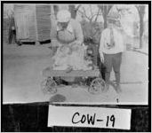 [Photograph of children playing with two babies in a wagon, Newnan, Coweta County, Georgia, ca. 1920]