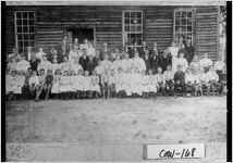 [Photograph of students and a teacher posing outside Mount Carmel, Coweta County, Georgia, ca. 1895]
