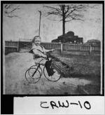 [Photograph of a young boy riding his bike in his yard, Roberta, Crawford County, Georgia, 1905]