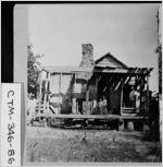[Photograph of an African-American family on the front porch of their house, Chatham County, Georgia, ca. 1880 ]