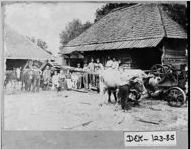 [Photograph of John W. Hunt and family with a wheat threshing machine, near Tucker, DeKalb County, Georgia, ca. 1900]