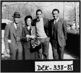 [Photograph of Willie Johnson and his wife with their grandsons, Lithonia, DeKalb County, Georgia, spring 1984]