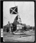 [Photograph of Confederate veteran standing beside the Confederate Monument, Albany, Dougherty County, Georgia, 1903 April 26]