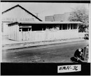 [Photograph of shelter that housed various bins used to collect materials for the war effort, Swainsboro, Emanuel County, Georgia, between 1939 and 1945]