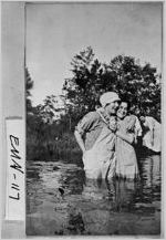 [Photograph of young people enjoying the water at McKinney's Pond, Emanuel County, Georgia, not after 1920]
