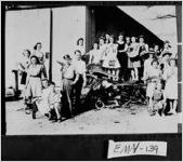 [Photograph of youngsters participating in a scrap metal drive to assist in the war effort, Swainsboro, Emanuel County, Georgia, 1942]