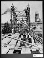 [Photograph of reflooring of Fifth Avenue bridge, Floyd County, Georgia, ca. 1918]