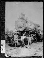 [Photograph of men in front of Georgia Railroad engine number 31, Rome, Floyd County, Georgia, 1914]