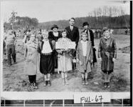 [Photograph of children planting trees honoring famous Georgians, Atlanta, Fulton County, Georgia, 1933]