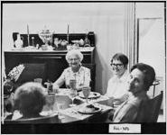 [Photograph of Mrs. William Perrin Nicolson Jr. with dinner guests, Atlanta, Fulton County, Georgia, 197-]