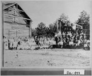 [Photograph of a group outside]