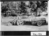 [Photograph of farmer on tractor, Fulton County, Georgia, 1950]
