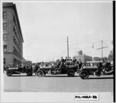 [Photograph of men in cars, Fulton County, Georgia]
