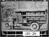 [Photograph of Private E. A. Vinton posed with World War I ambulance, Georgia, 1918]