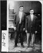 [Postcard of two unidentified young men by railroad tracks, Georgia, ca. 1915]