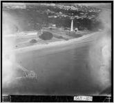 [Photograph of shoreline with lighthouse, Glynn County, Georgia]