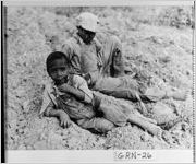 [Photograph of two African-American boys sitting, Bethany, Greene County, Georgia, 1941 May]