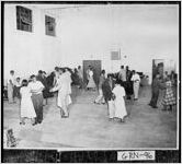 [Photograph of African-American couples dancing in a large room, Greensboro, Greene County, Georgia, 1950 or 1951]