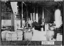 [Photograph of Beaver Creek Mill with its owner inside, Greene County, Georgia, between 1911 and 1920]