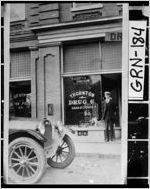[Photograph of the exterior of Thornton Drug Company with a boy in front, Union Point, Greene County, Georgia, 1918]