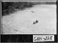 [Photograph of two men in a boat as seen from a bridge, Greene County, Georgia, 1937 Dec.]