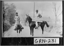 [Photograph of two minstrels on horseback, Greensboro, Greene County, Georgia, 1934 Apr. 16]