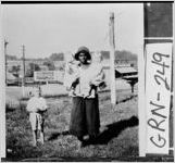 [Photograph of an African-American girl holding two babies, Union Point, Greene County, Georgia, ca. 1933]
