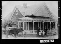 [Photograph of the Smith home with family members in front, Lawrenceville, Gwinnett County, Georgia, 1908]