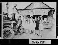 [Photograph of 4-H members posing in front of a store, Gwinnett County, Georgia, 1926]