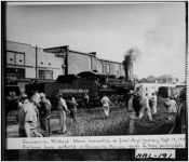 Gainesville Midland Railway steam locomotive on final day's journey, Sept. 15, 195[9?] Railway fans gathered in Gainesville Railway Yards to take photographs
