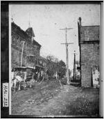 [Photograph of Thomas H. Brown in front of the Arlington Hotel, Gainesville, Hall County, Georgia, ca. 1890]