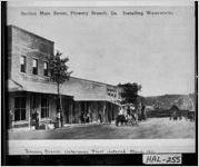 Section Main Street, Flowery Branch, Ga. Installing Waterworks. Flowery Branch Waterworks Plant installed March, 1911