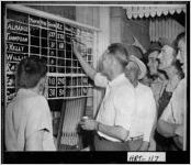 [Photograph of posting of election returns on a drugstore window, Hartwell, Hart County, Georgia, 1948 Sept.]