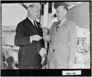 [Photograph of Mayor Walter Harrison giving key to city to U.S. Postmaster General, Millen, Jenkins County, Georgia, 1938 Apr. 27]