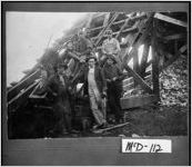 [Photograph of Columbia Gold mine miners with young boy, McDuffie County, Georgia, ca. 1925]