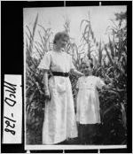 [Photograph of Jennie Morris and Lucille Jones in cornfield, Thomson, McDuffie County, Georgia, ca. 1918]